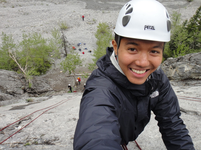 At the top of a much higher climb later in the day. It was a long way down. Yatta!! Awesome climbs rocks!