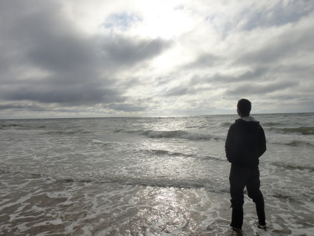 Pensive at the North Sea. Or going to the bathroom…