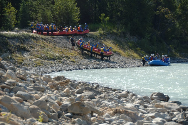 Carrying the rafts into the water