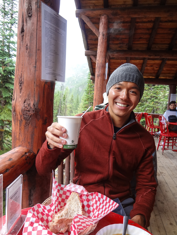 Eating a tuna salad sandwich with a mocha