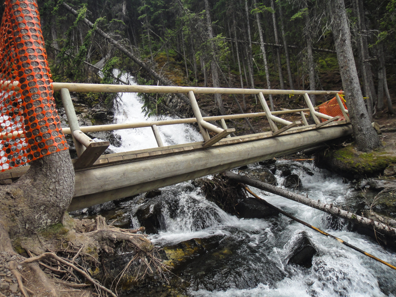 Broken bridge across Sarrail Creek