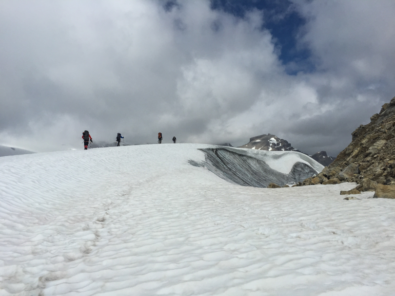 Crossing the glacier. This would be a great location for crevasse rescue practice.