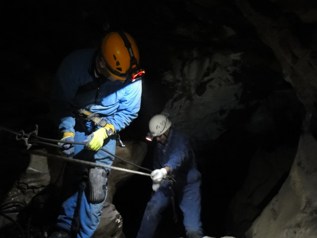 Rappelling 18 metres into the cave
