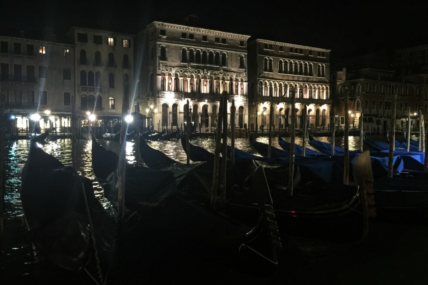 Gondolas along the Grand Canal at night