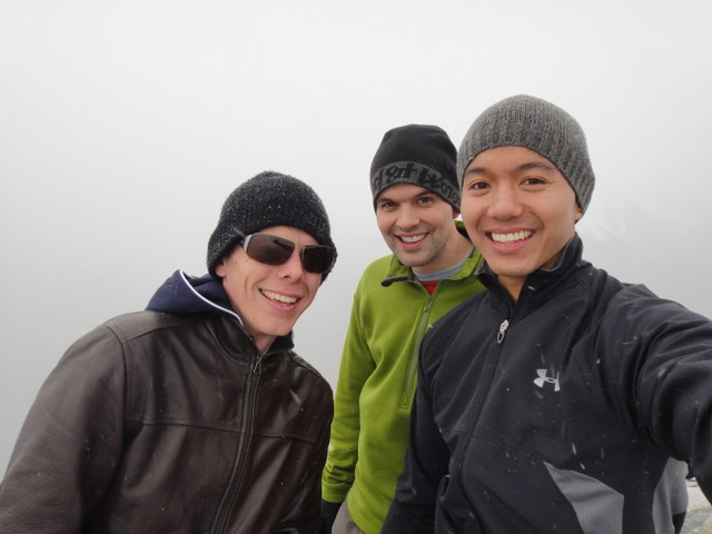 At the summit. The snow was rolling in…