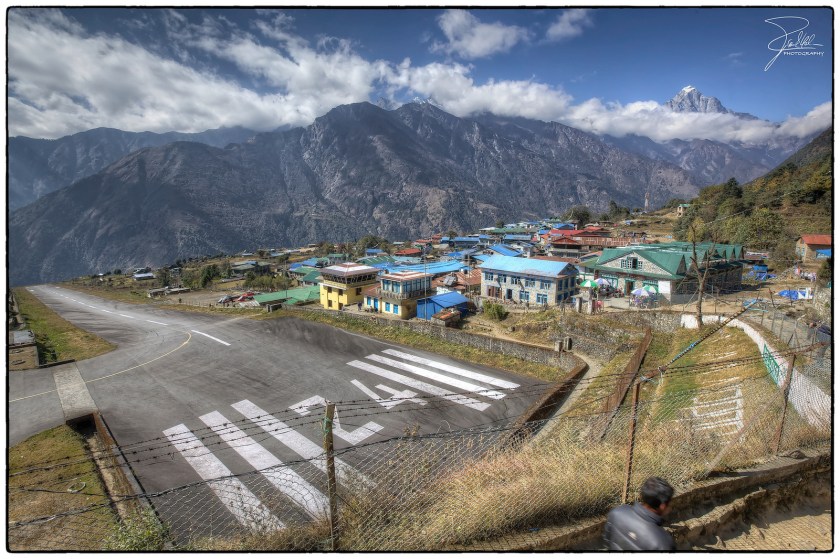 Tenzing-Hillary Airport in Lukla. I think that's a cliff at the end of the runway. Photo credit: Frank Kehren https://flic.kr/p/dyyEJY