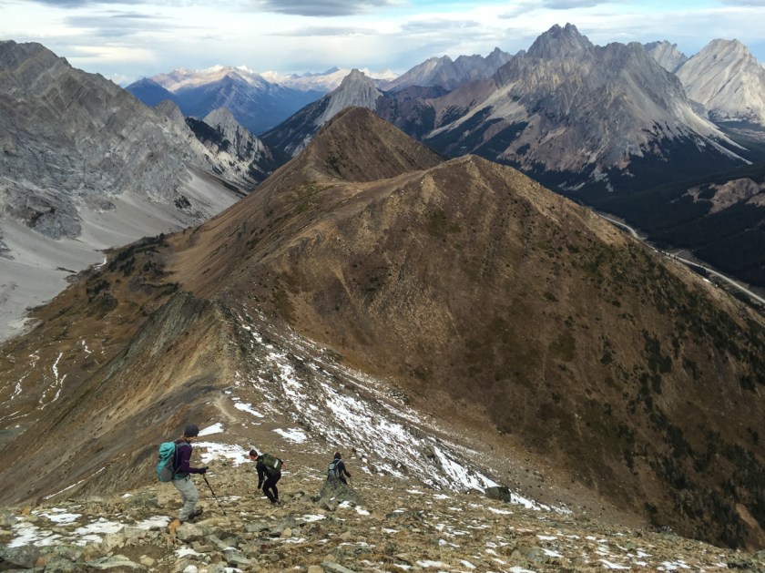 Descending from the first peak. Only 3 to go!