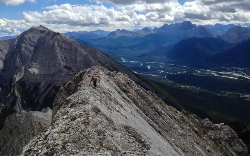 Paul makes his way along the knife-edge. Incredible views all around.