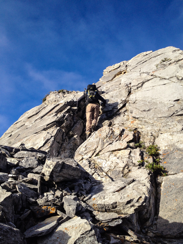 Scrambling our way to the summit. I'm pretty sure this rock face was avoidable... but oh so fun!